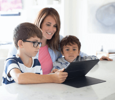 Mom and children with tablet